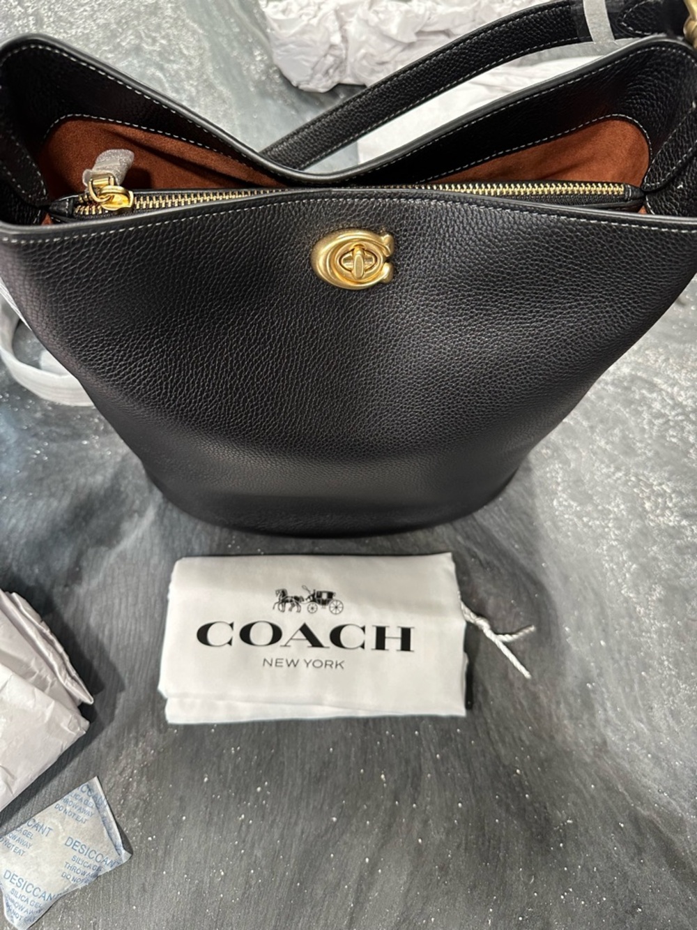Coach Black Pebbled Leather Bucket Bag with Gold Hardware Accent